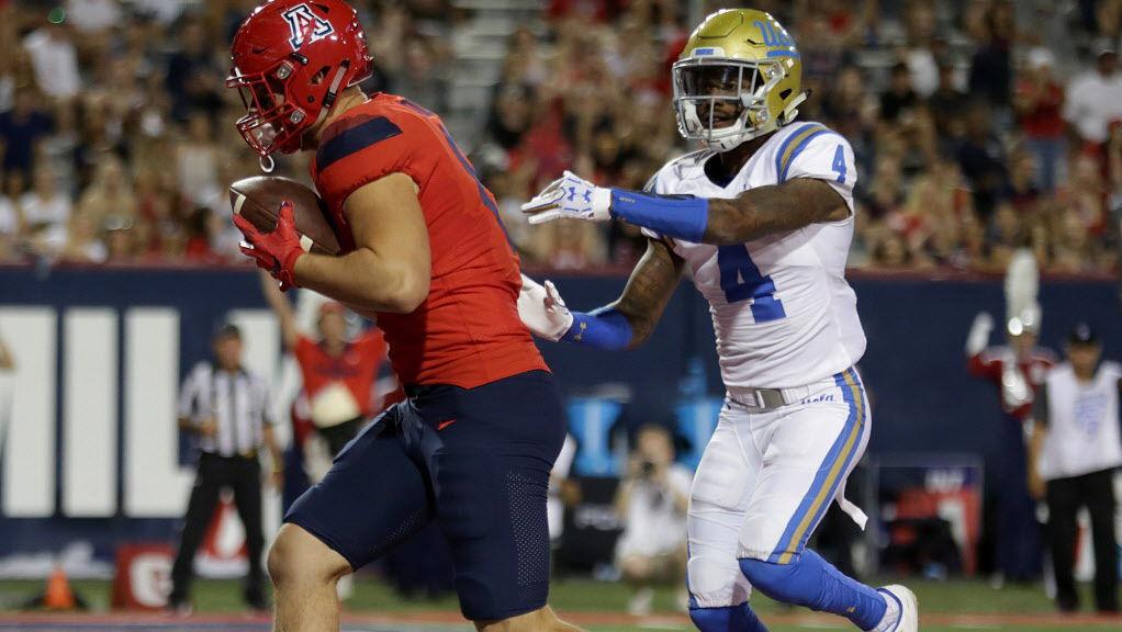 Like father, like son? Trevor Wood is a candidate for D-line duty for Arizona Wildcats